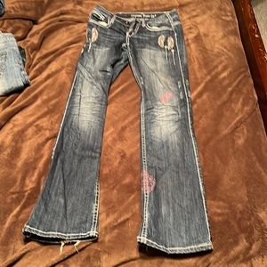 Cowgirl Tuff- Fly W-27 L-35 Lots of weird stains and some ware on the bottom.